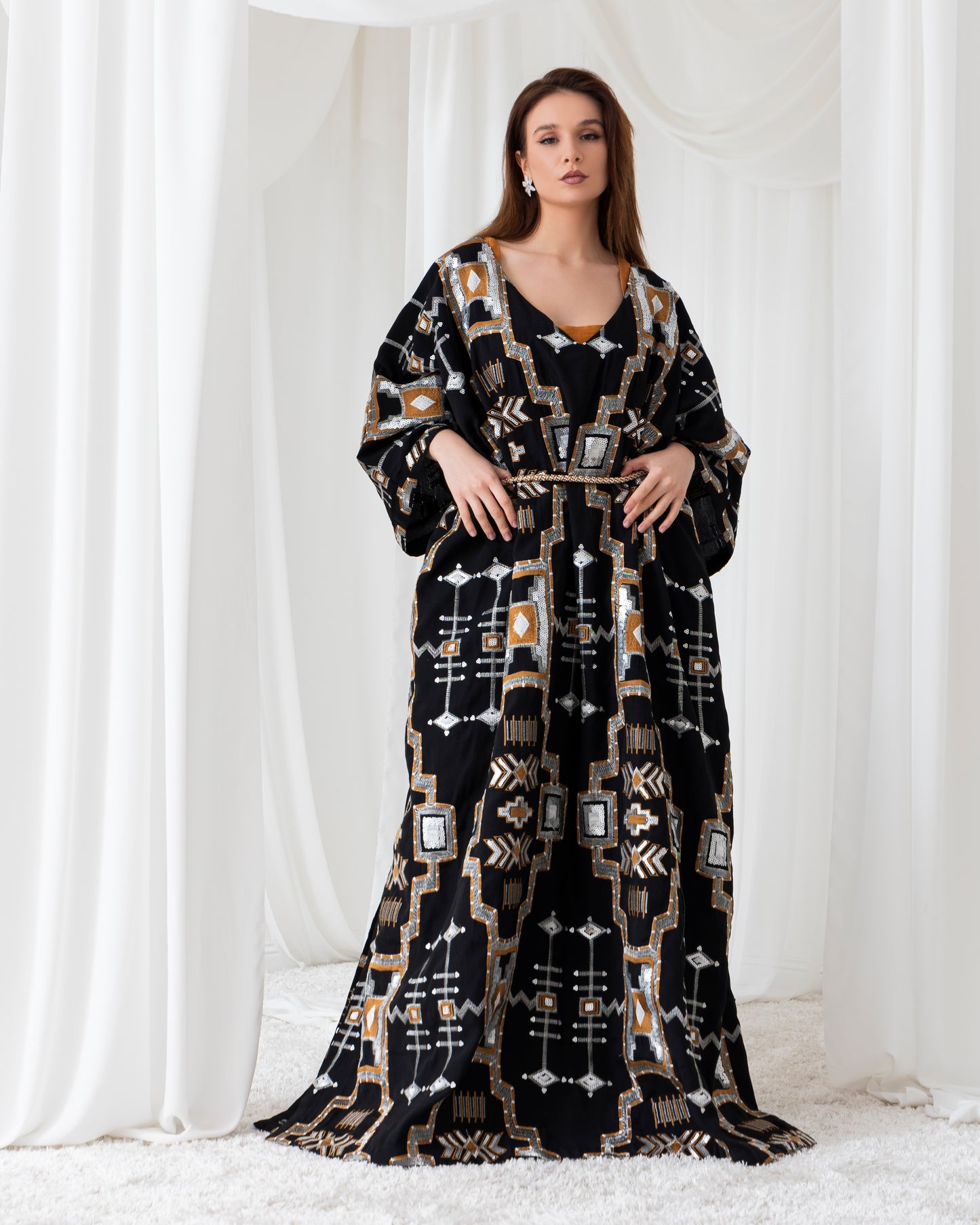 A radiant abaya that shines with confidence. Designed for the bold and beautiful