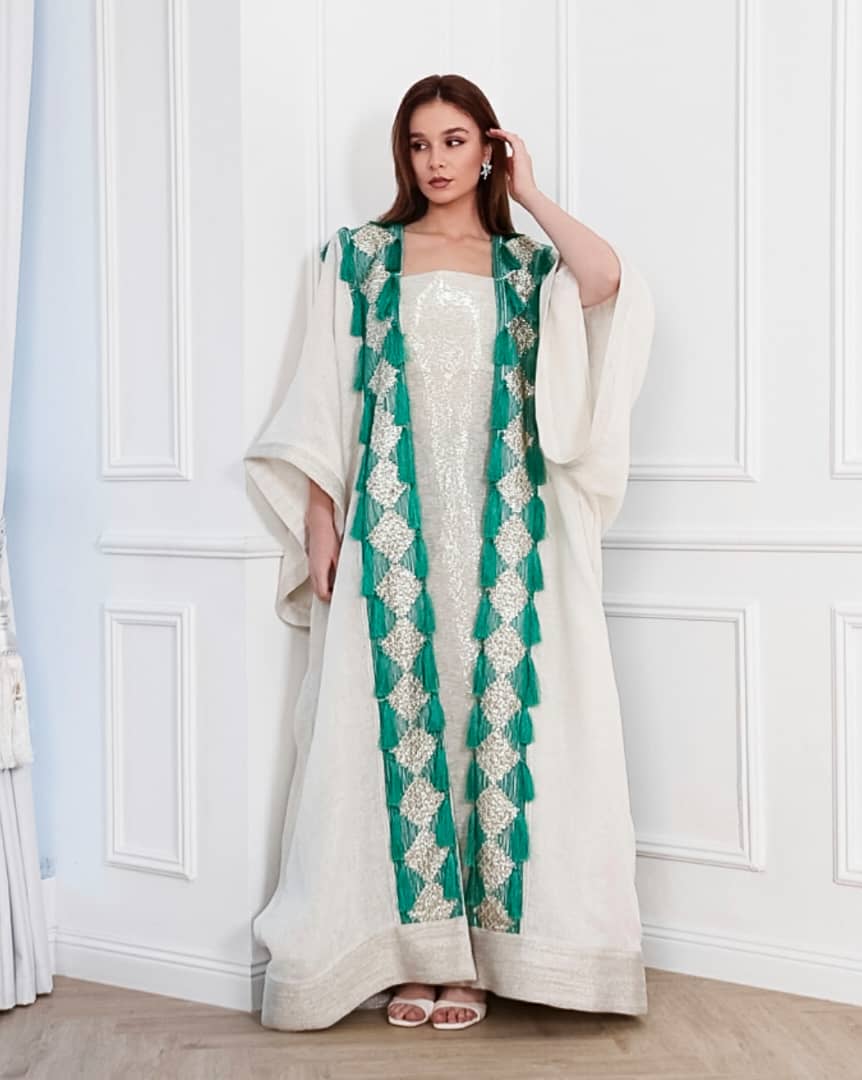 Agreen gold abaya that lights up any room. Designed to make you the center of attention