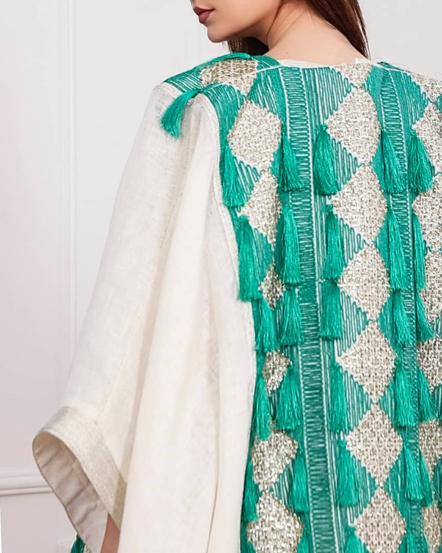 Agreen gold abaya that lights up any room. Designed to make you the center of attention