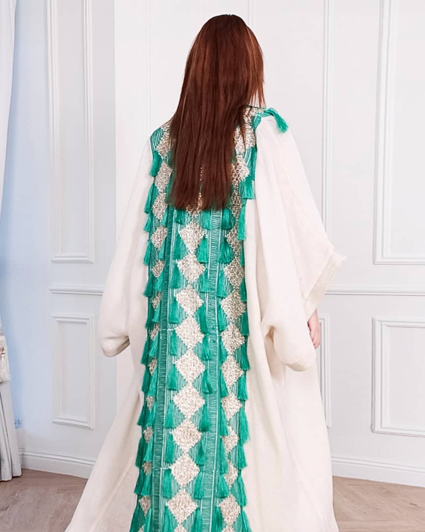 Agreen gold abaya that lights up any room. Designed to make you the center of attention