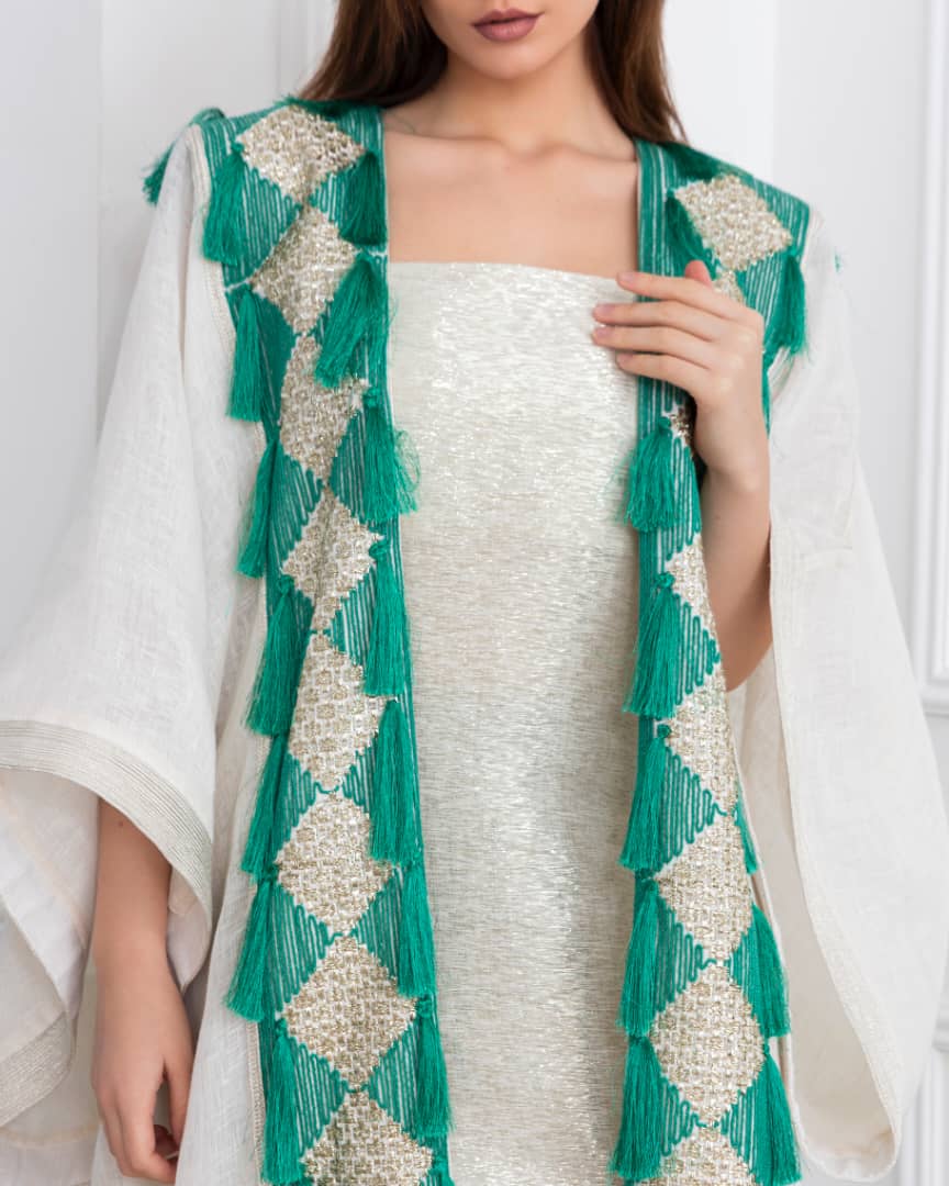 Agreen gold abaya that lights up any room. Designed to make you the center of attention