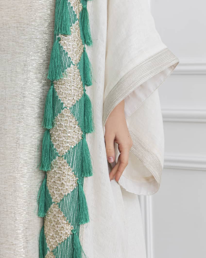 Agreen gold abaya that lights up any room. Designed to make you the center of attention