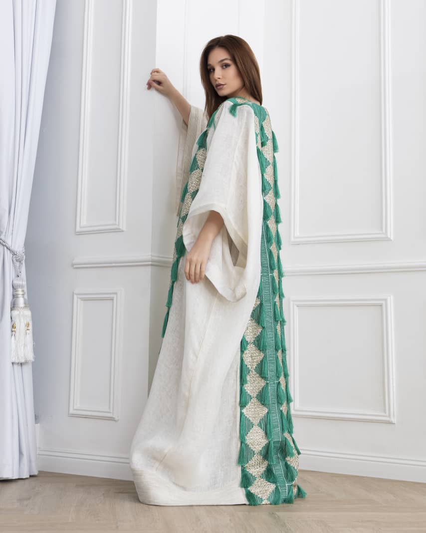 Agreen gold abaya that lights up any room. Designed to make you the center of attention