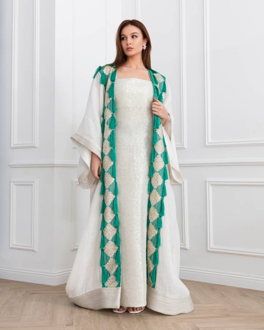 Agreen gold abaya that lights up any room. Designed to make you the center of attention